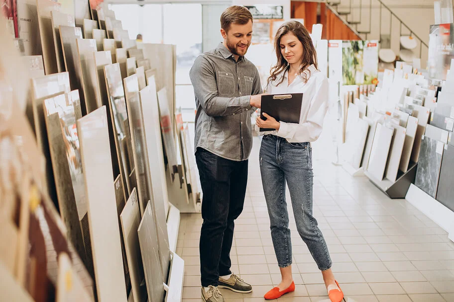 woman offer some material choices for the client in office